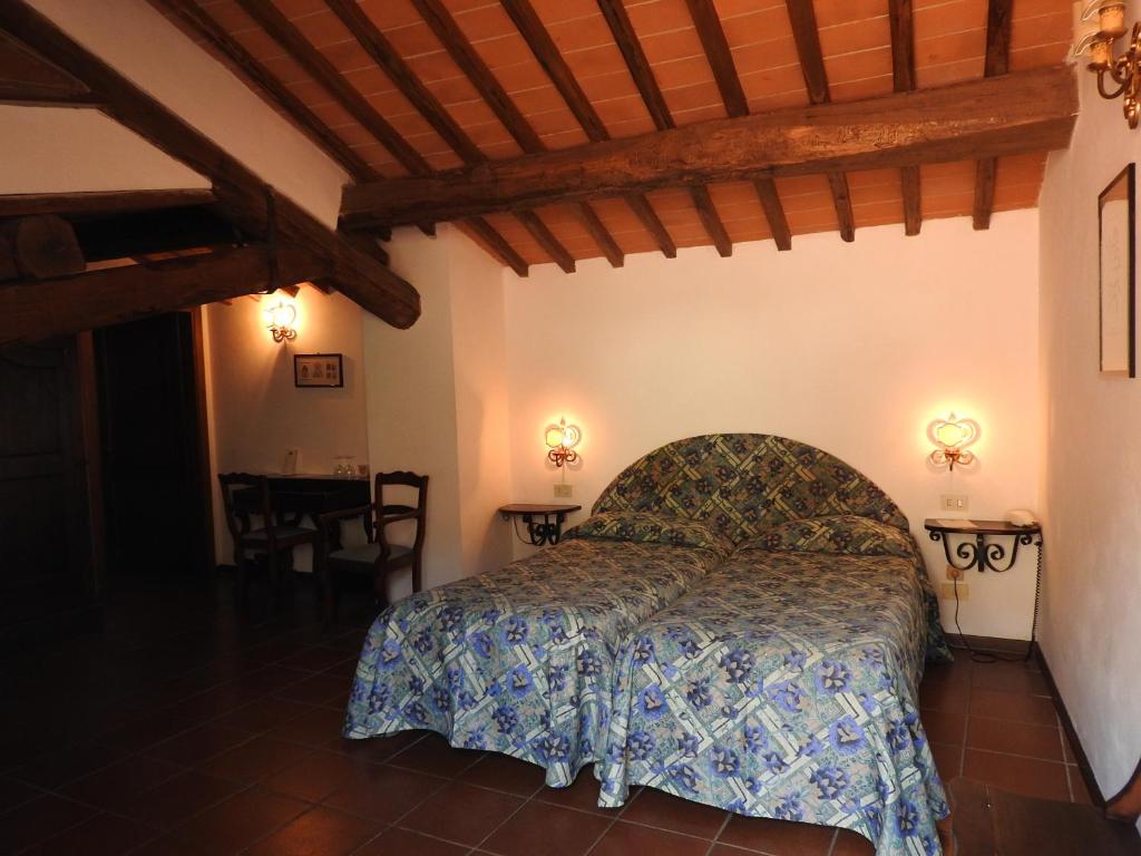 Posteľ alebo postele v izbe v ubytovaní Relais Borgo Di Toiano