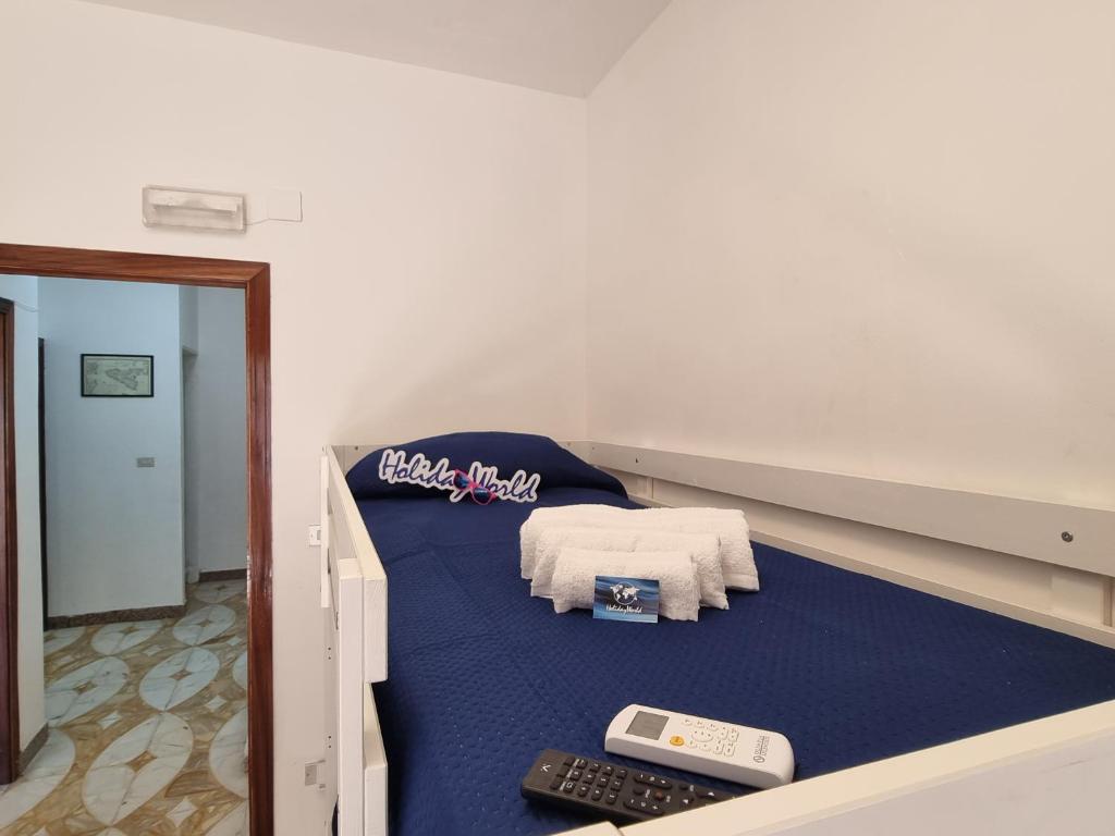 Postel nebo postele na pokoji v ubytování Borgo Di Taormina Apartments by Holiday World