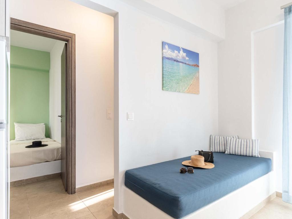 Postel nebo postele na pokoji v ubytování Evripus Suites