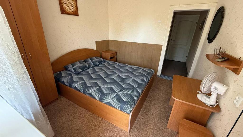 Postel nebo postele na pokoji v ubytování Ассоль