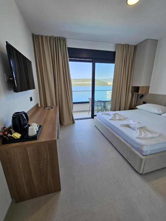 Postel nebo postele na pokoji v ubytování Apartmani Leženić M