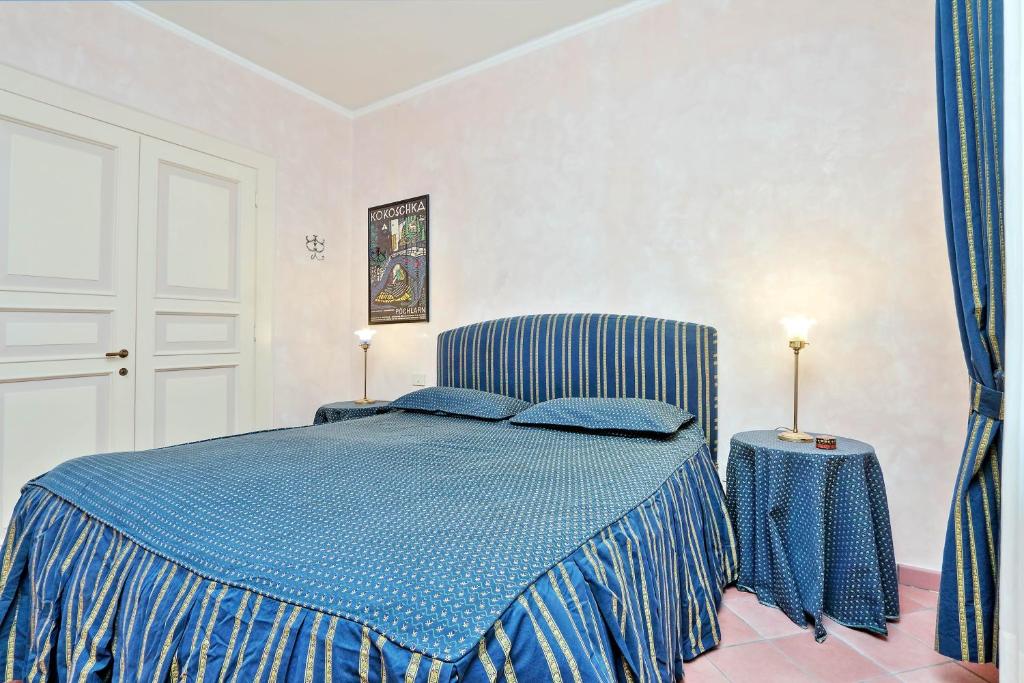 Posteľ alebo postele v izbe v ubytovaní Charmsuite Palladio