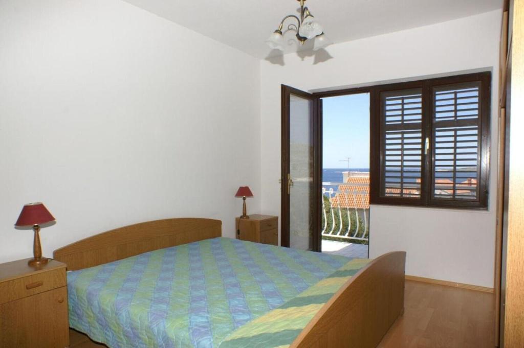 Posteľ alebo postele v izbe v ubytovaní Apartment AnteV