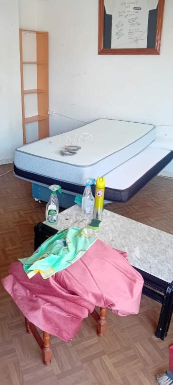 a bed sitting on the floor in a room at Cryptocalp in Calpe