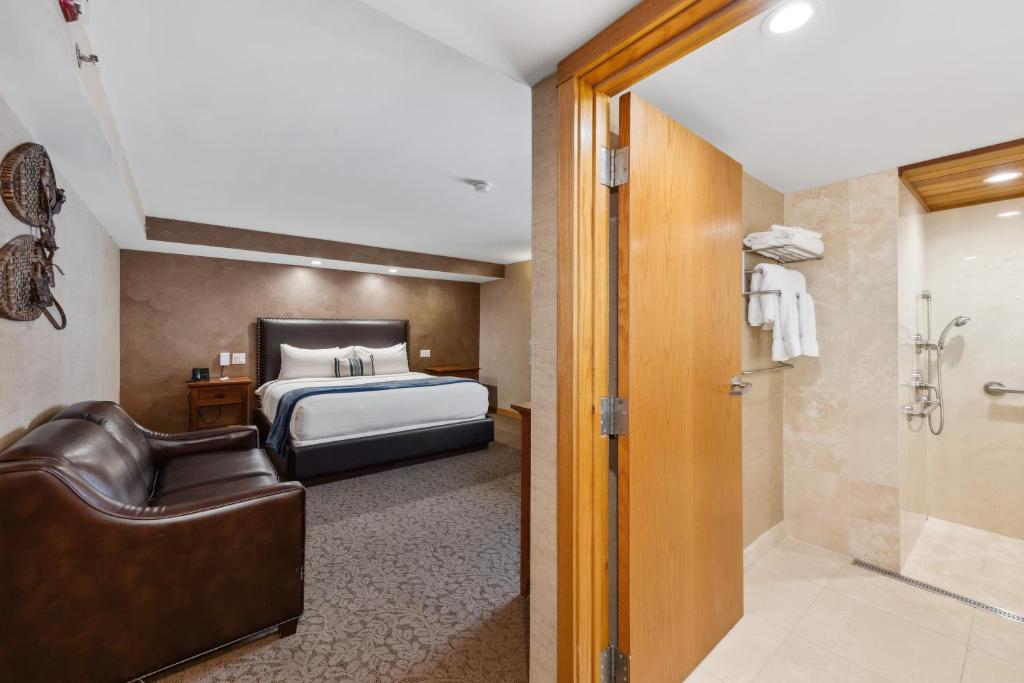 Voodi või voodid majutusasutuse Golden Arrow Lakeside Resort toas