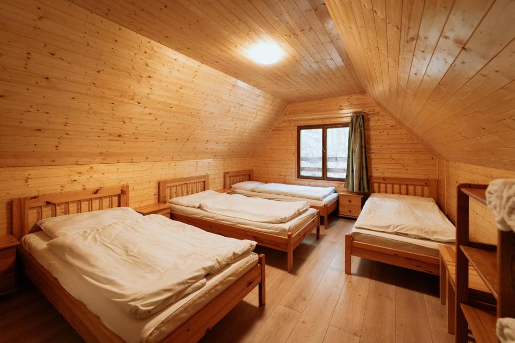 Voodi või voodid majutusasutuse Horský hotel Bartoška toas