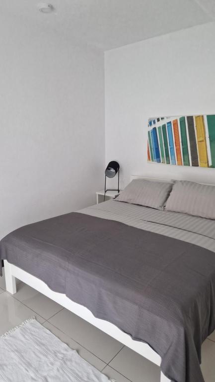 Ein Bett oder Betten in einem Zimmer der Unterkunft Basic Mansion Mandalina