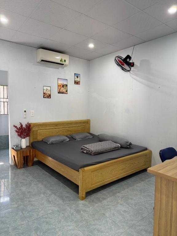 Postel nebo postele na pokoji v ubytování Nhà nghỉ Thu Bông - Thu Bong motel