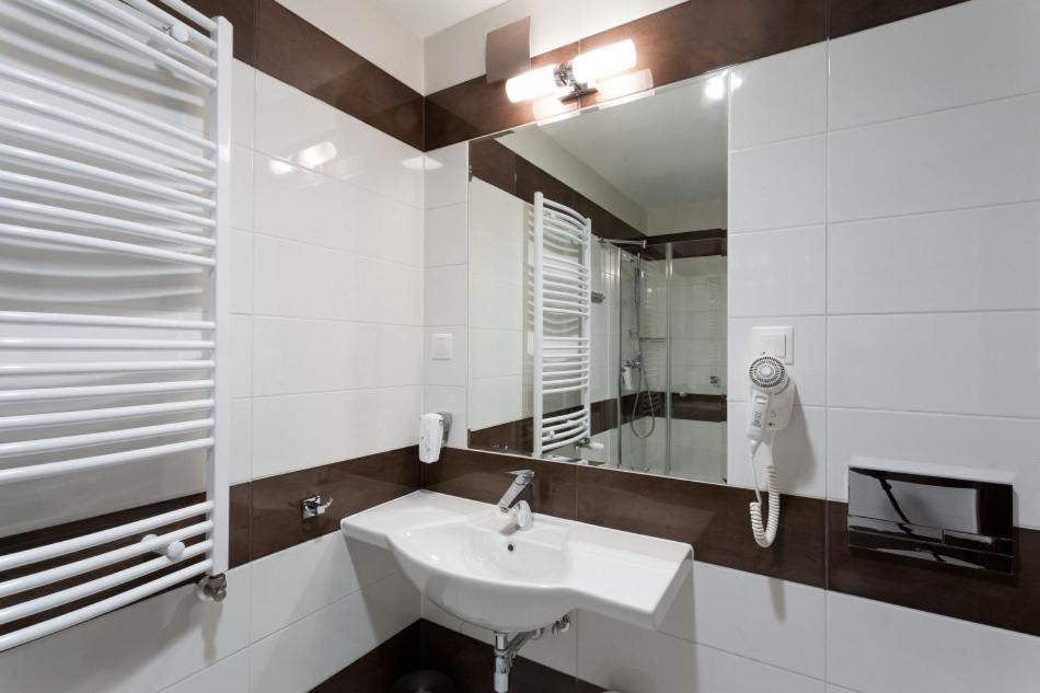 Koupelna v ubytování Hotel Milenium