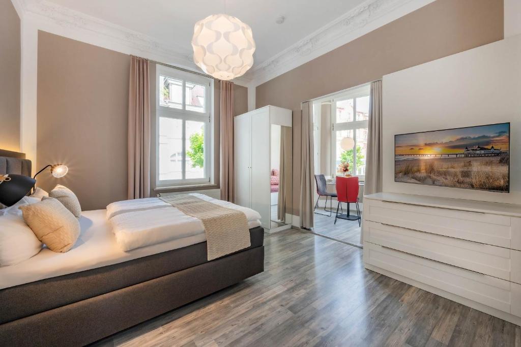 Postel nebo postele na pokoji v ubytování Villa Carmen Bernstein