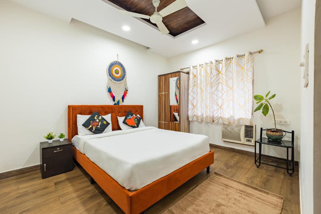 Postel nebo postele na pokoji v ubytování 2BHK Homestay in Candolim