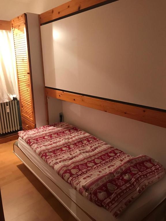 Postel nebo postele na pokoji v ubytování Residence Artuik Appartamenti Solandra