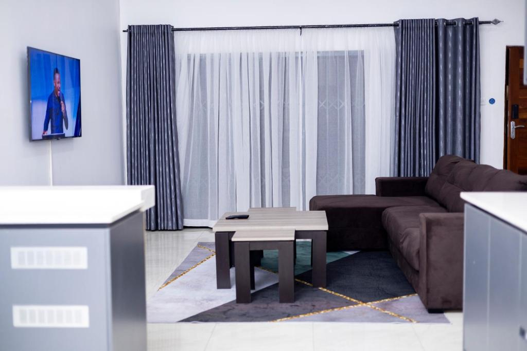 TV a/nebo společenská místnost v ubytování Parresia Haven