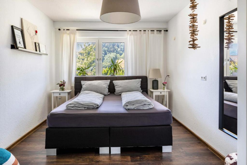 Postel nebo postele na pokoji v ubytování Haus Albi