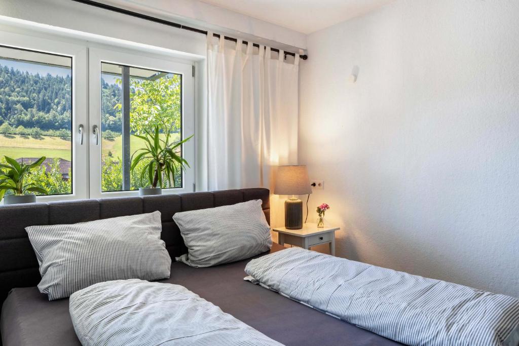 Postel nebo postele na pokoji v ubytování Haus Albi