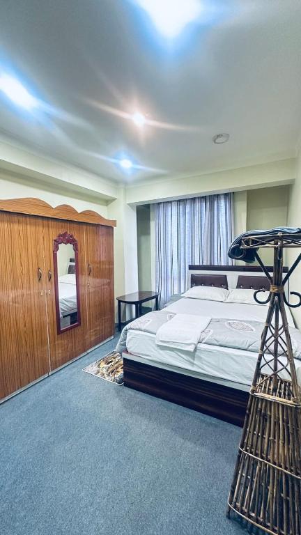 Postel nebo postele na pokoji v ubytování Mohammad Ali Hotel & Restaurant