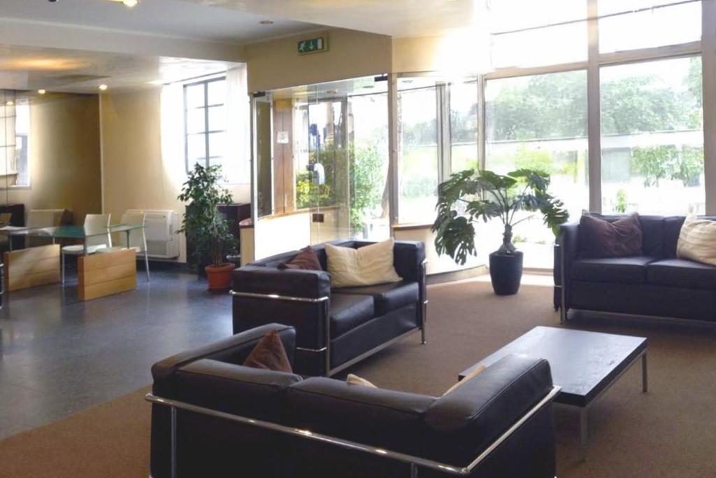 Posezení v ubytování B&B HOTEL First