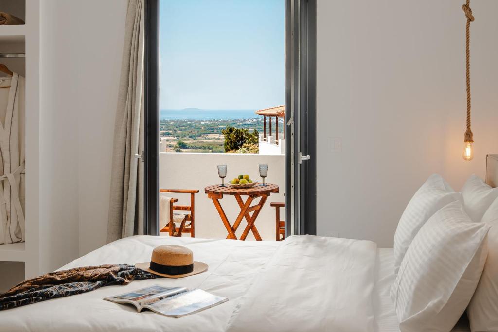 Ένα ή περισσότερα κρεβάτια σε δωμάτιο στο Naxos Balcony Apartments