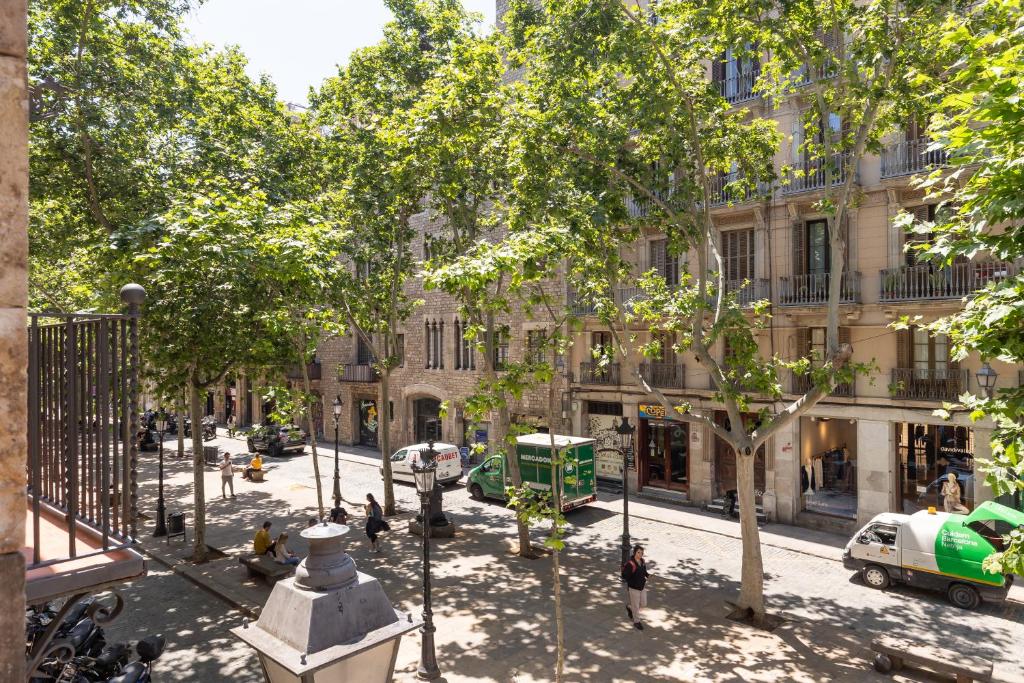 a view of a city street with trees and buildings at Decô Apartments Barcelona-Born St. in Barcelona