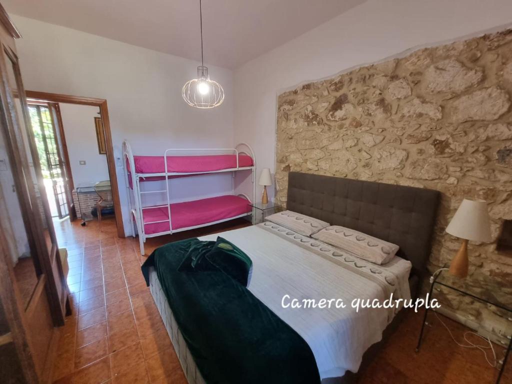 Postel nebo postele na pokoji v ubytování Asparano