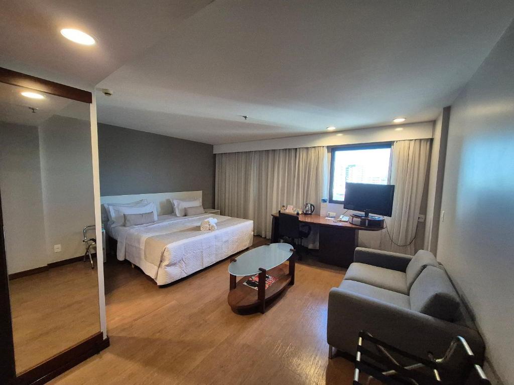 Postel nebo postele na pokoji v ubytování Flat Hotel Ibirapuera Moema Apto 1006A