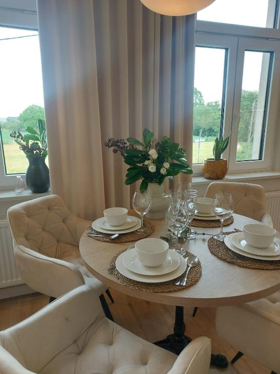 Posedenie v ubytovaní Apartamenty Toszeckie LUX