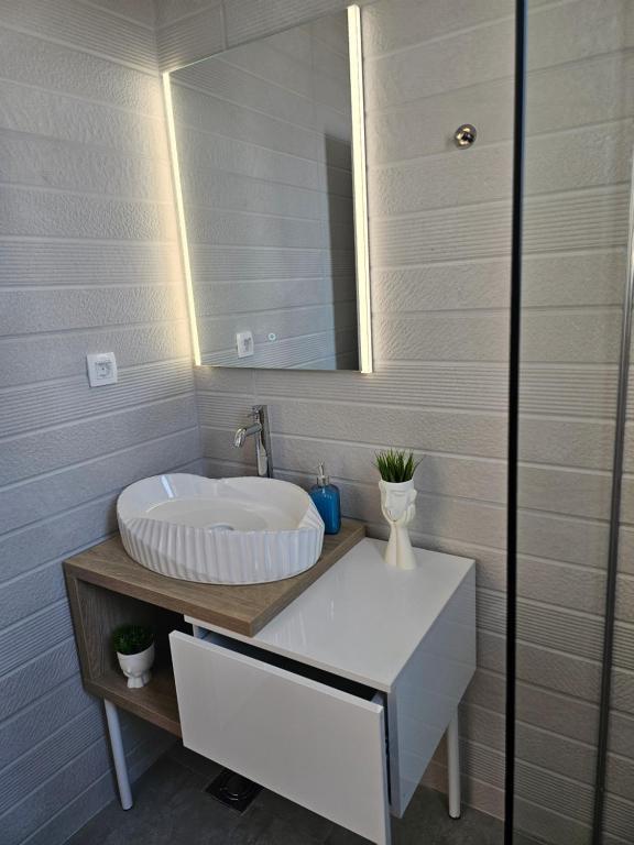 Koupelna v ubytování La Vida Apartments