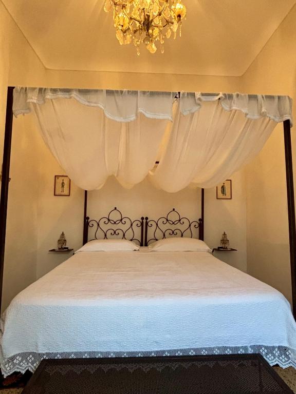 Postel nebo postele na pokoji v ubytování Casa Scianna Noto