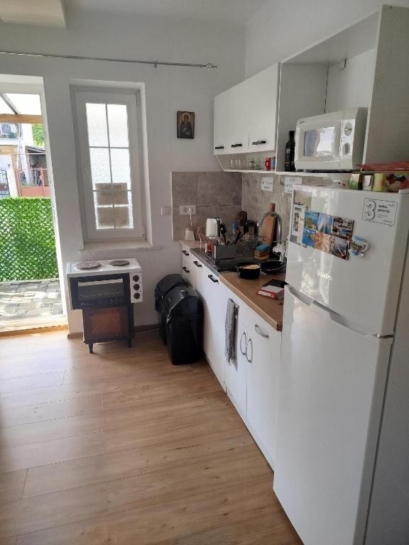 Kuchyň nebo kuchyňský kout v ubytování Hostel Vintage