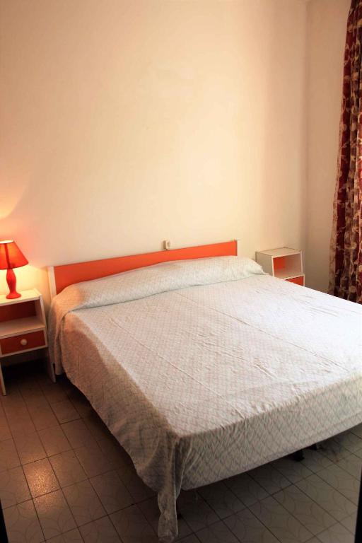 Posteľ alebo postele v izbe v ubytovaní Apartment in Rosolina Mare 25073