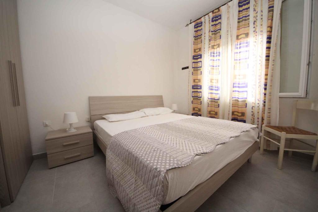 Posteľ alebo postele v izbe v ubytovaní Apartment in Rosolina Mare 25073