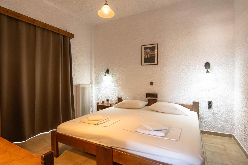 Postel nebo postele na pokoji v ubytování Delfini Apartments