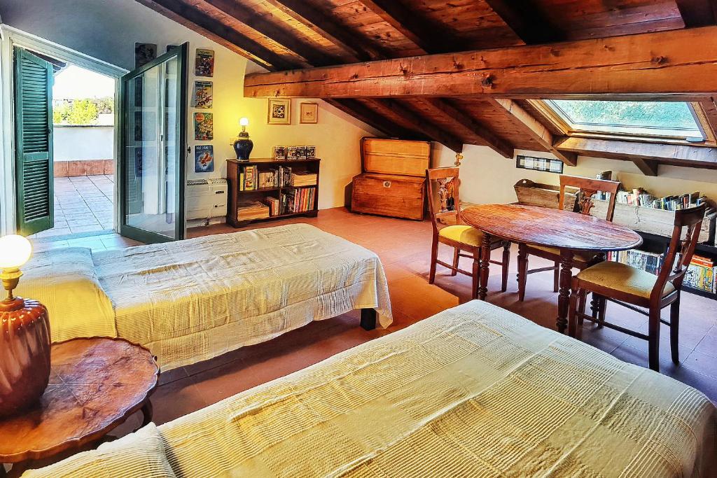 Postel nebo postele na pokoji v ubytování B&B Due Fiumi 1908