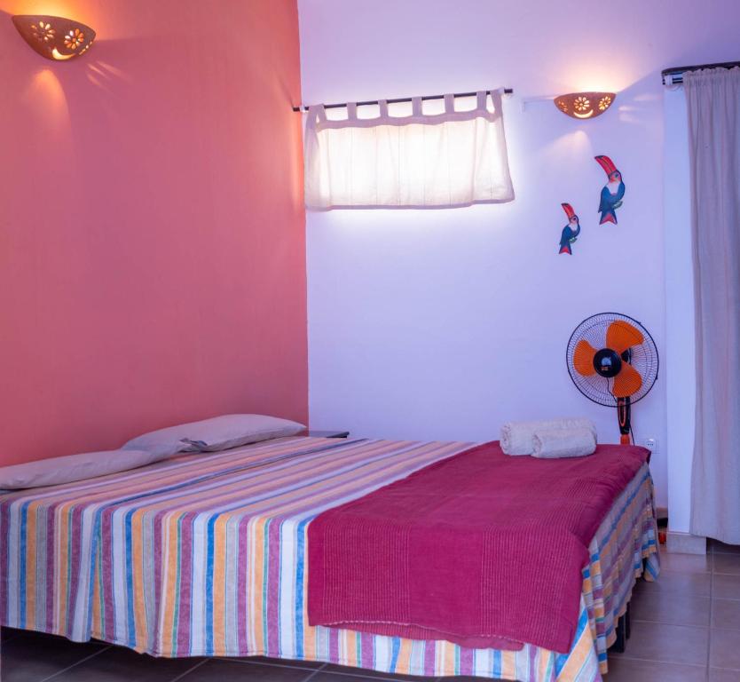 Postel nebo postele na pokoji v ubytování Sakaroule B&B