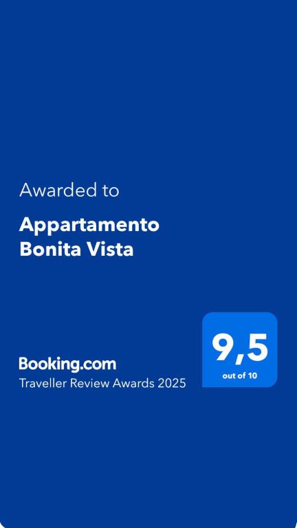 a screenshot of a cell phone with the text awarded to apartmenterate gorilla visa at Appartamento Bonita Vista in Colico