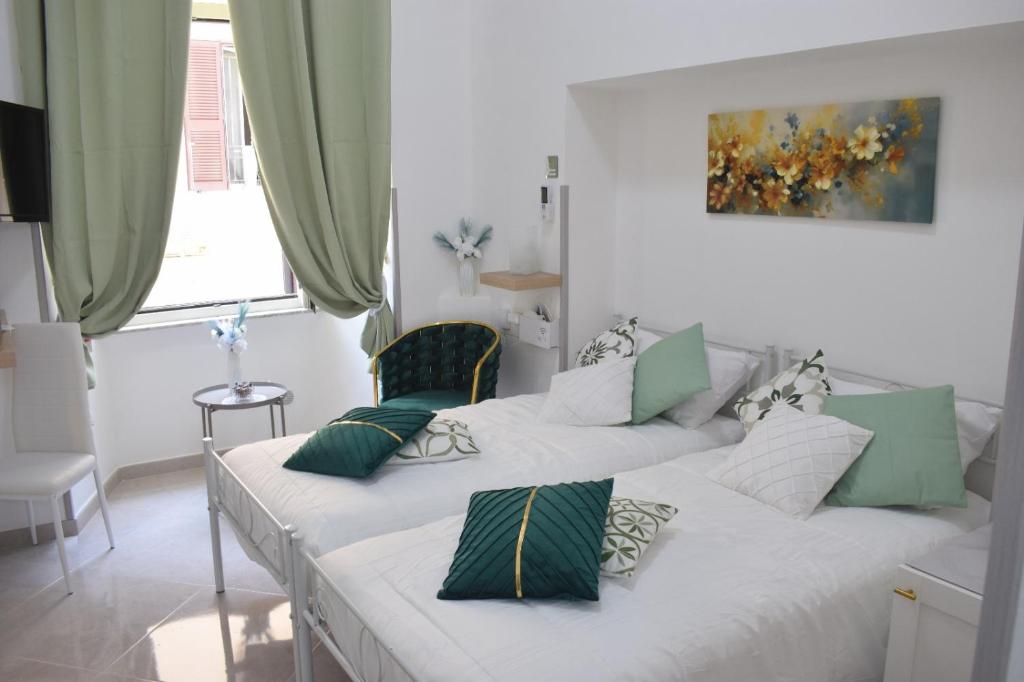 Postel nebo postele na pokoji v ubytování Falanga Family Guests Accommodation