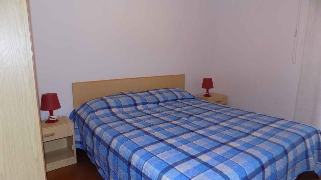 Postel nebo postele na pokoji v ubytování Apartment in Eraclea Mare 25654