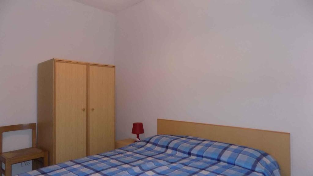 Postel nebo postele na pokoji v ubytování Apartment in Eraclea Mare 25654