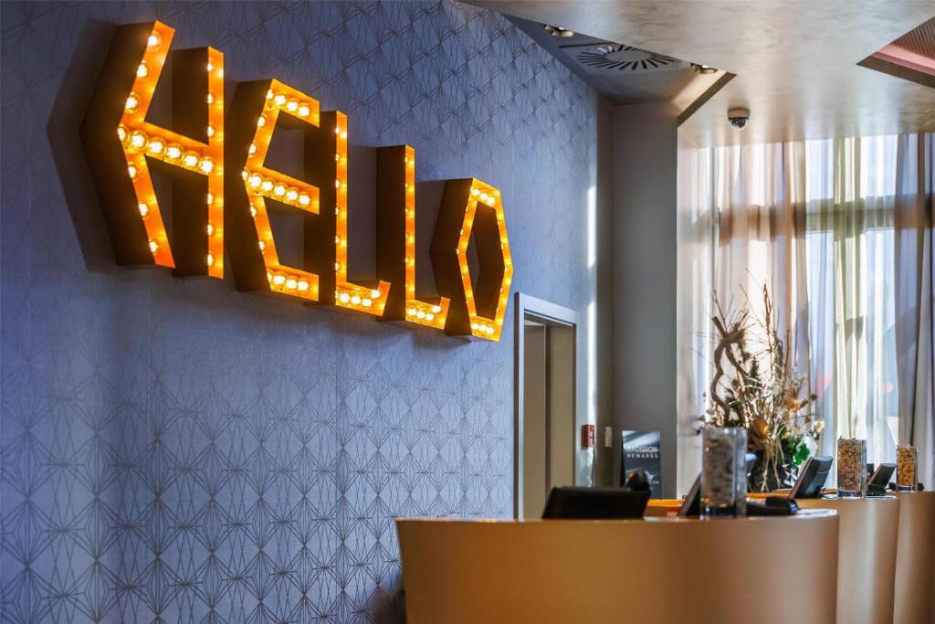 a sign that says klitz hanging on a wall at Park Plaza Nuremberg in Nuremberg