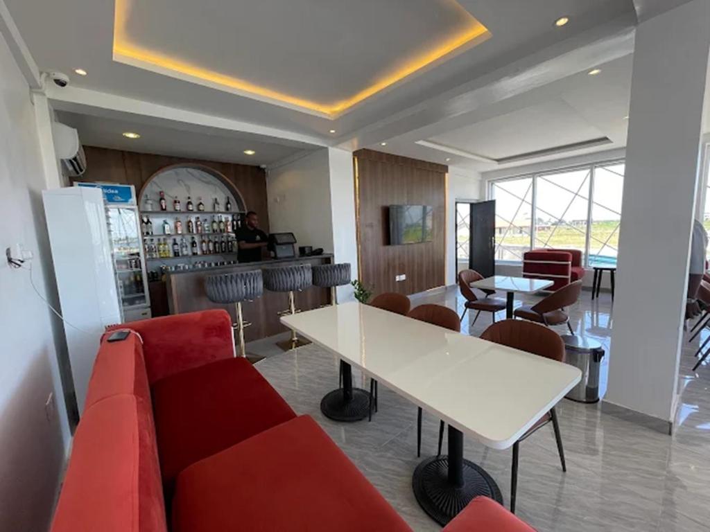 Posezení v ubytování HomeWorth Hotel