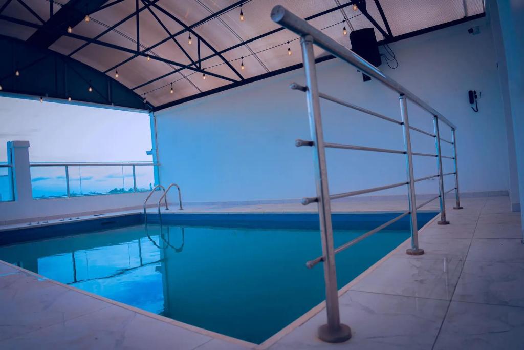 Bazén v ubytování HomeWorth Hotel nebo v jeho okolí