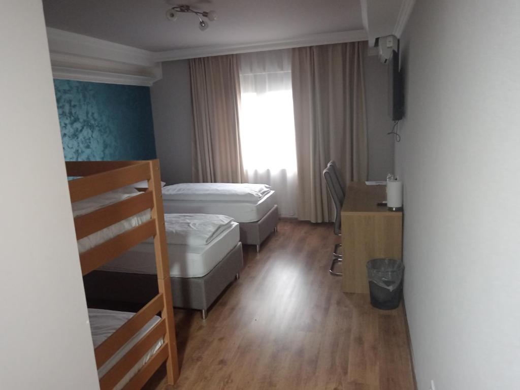 Postel nebo postele na pokoji v ubytování Vila Kristina