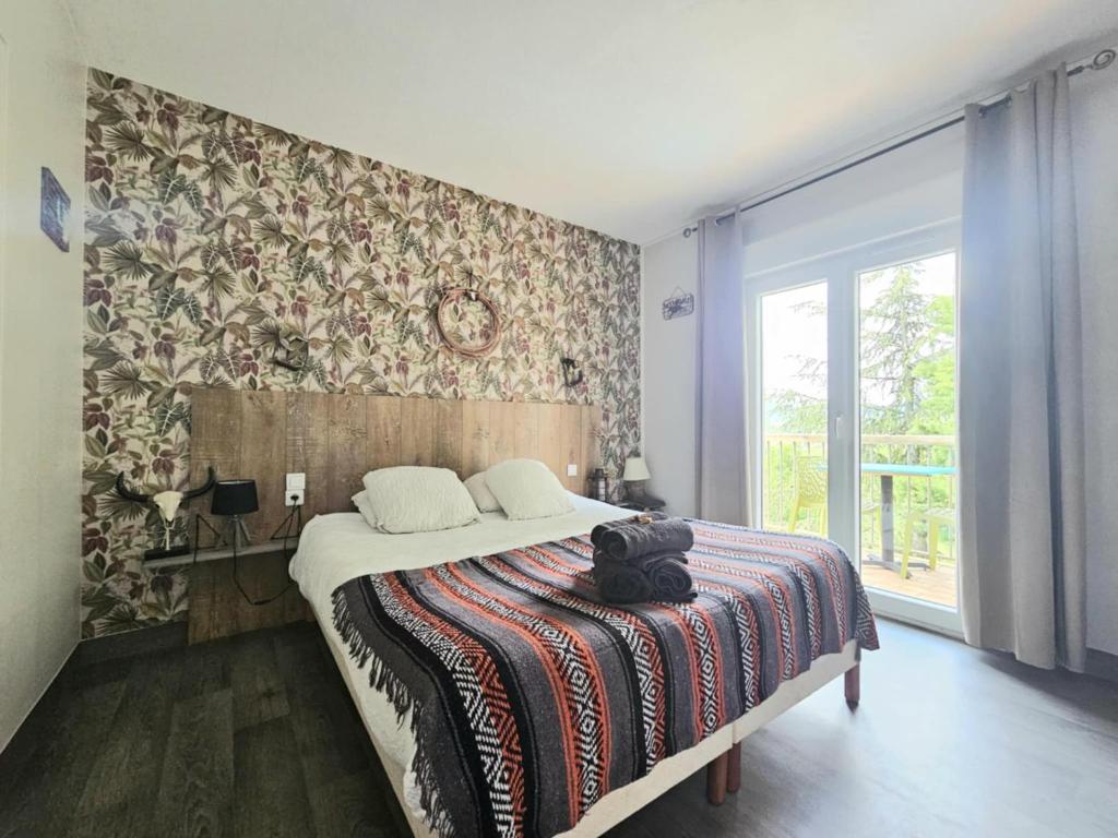 Postel nebo postele na pokoji v ubytování Logis Hôtel Restaurant L'Escapade