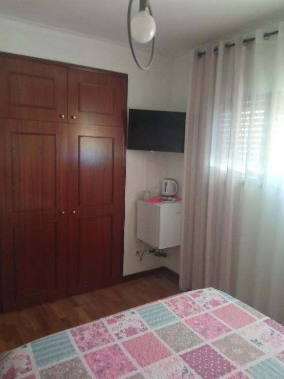 Postel nebo postele na pokoji v ubytování Lélé