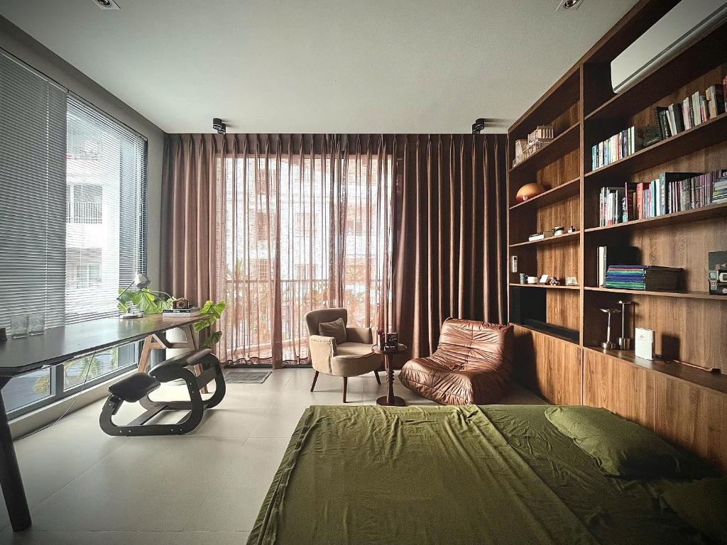Гостиная зона в Owl's Night Homestay - Keo House