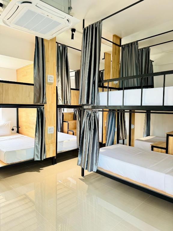 Postel nebo postele na pokoji v ubytování Activate C3 Hostel