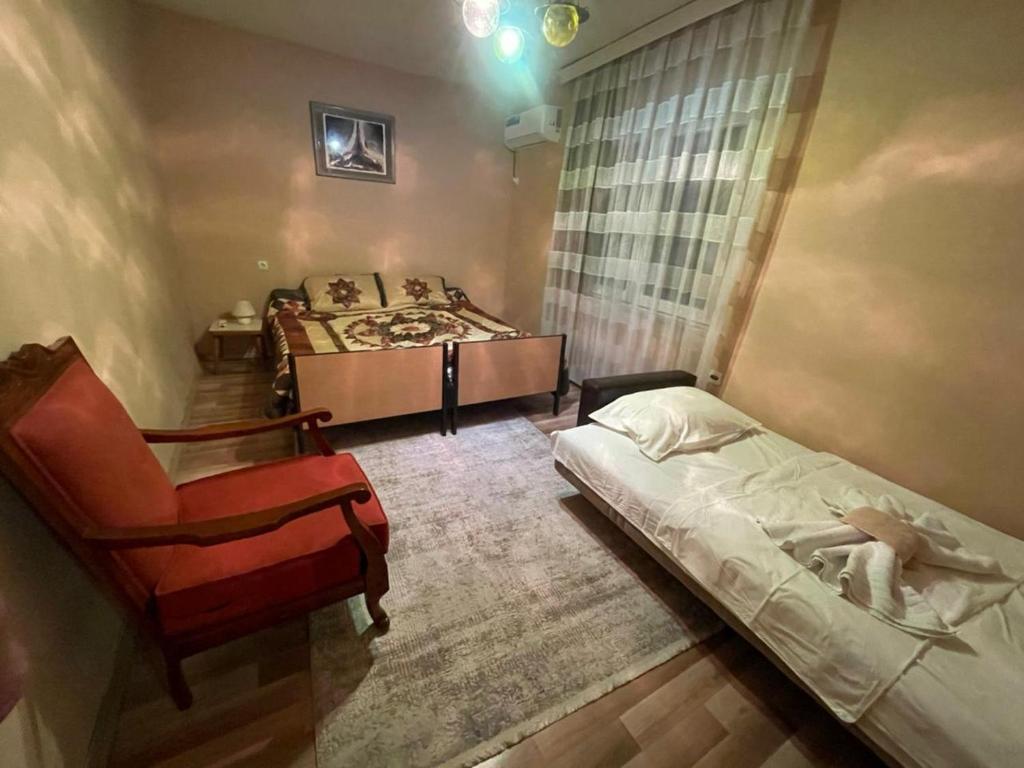 Postel nebo postele na pokoji v ubytování Prizren Home