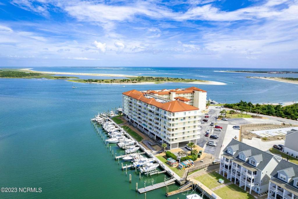 an aerial view of a marina with boats in the water at Waterfront Resort , World Class Marina & Slip in Beaufort