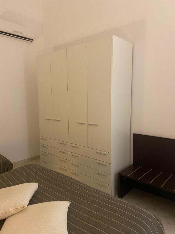 Postel nebo postele na pokoji v ubytování EMOZIONI
