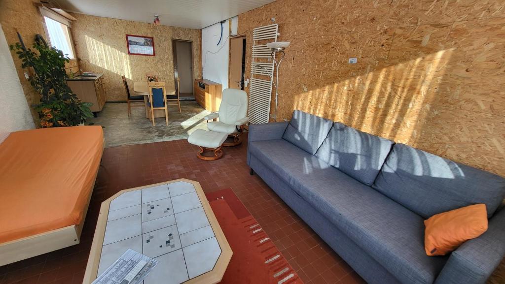 Predel za sedenje v nastanitvi Panoramaplatz